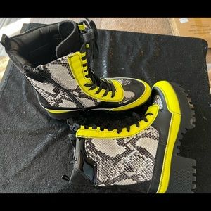 Snake skin and lime green and black combat boots